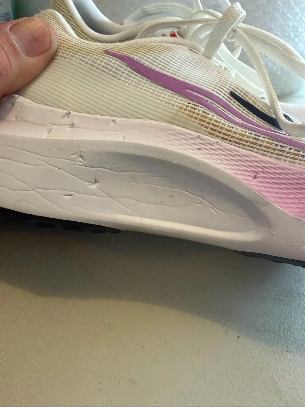 Nike women’s size 7 Zoom Fly multi color dog tooth marks